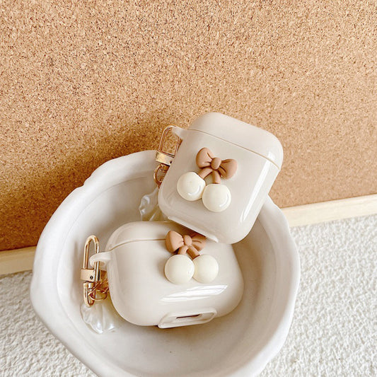 Creamy Beige Bow AirPod Case with Pearl & Shell Charm
