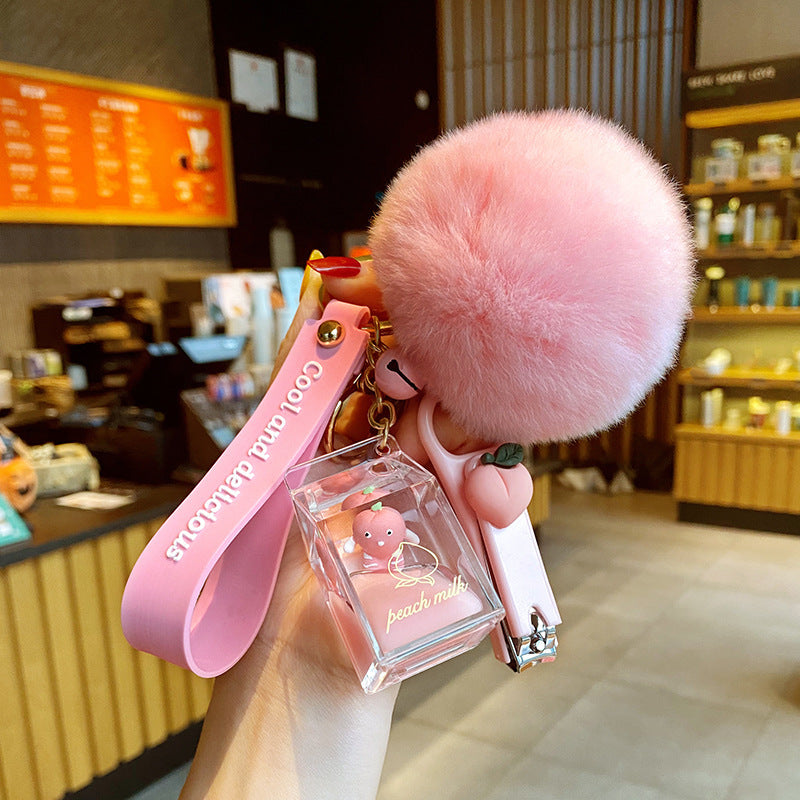 Cute 5-in-1 Keychains with Fur Ball, Paw, Nail Cutter, and Mini Calculator Charms