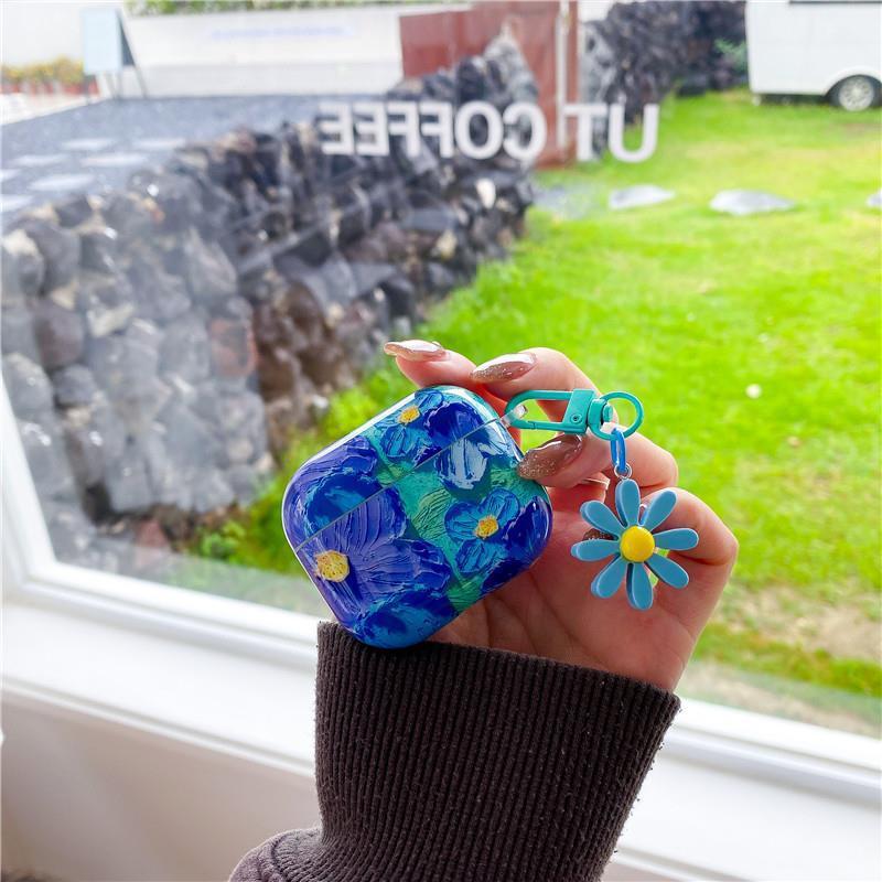 Glossy Oil Painted Floral Airpod Case with Daisy Charm Clip