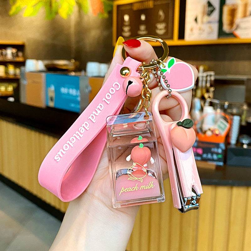 Cute 5-in-1 Keychains with Fur Ball, Paw, Nail Cutter, and Mini Calculator Charms