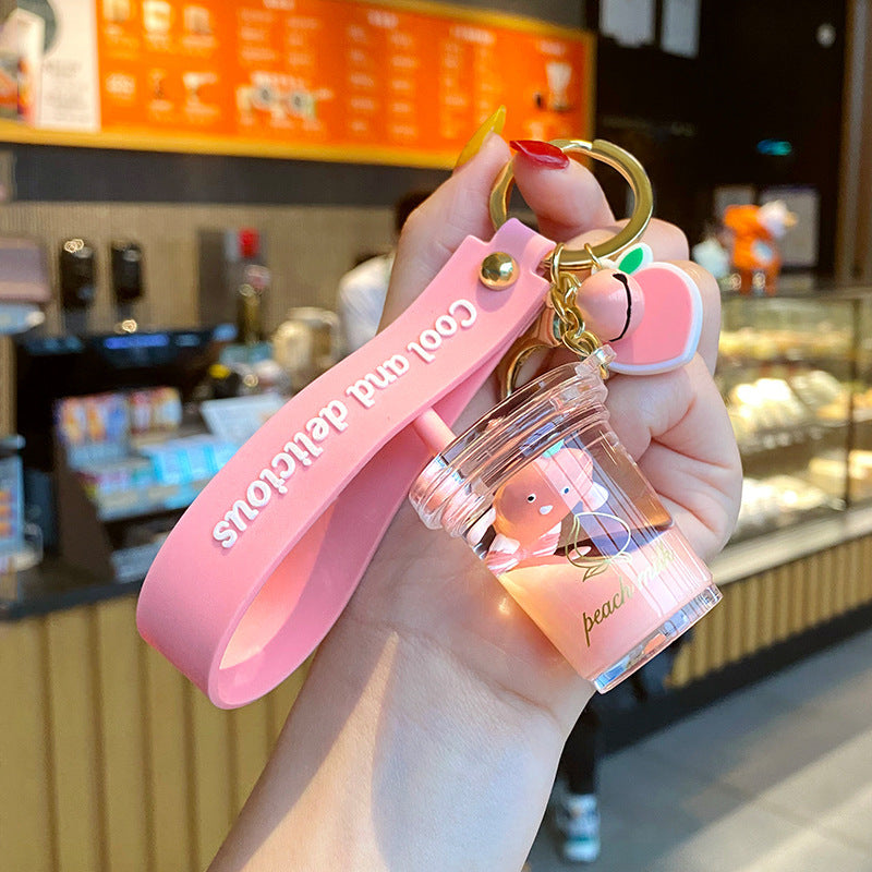 Cute 5-in-1 Keychains with Fur Ball, Paw, Nail Cutter, and Mini Calculator Charms