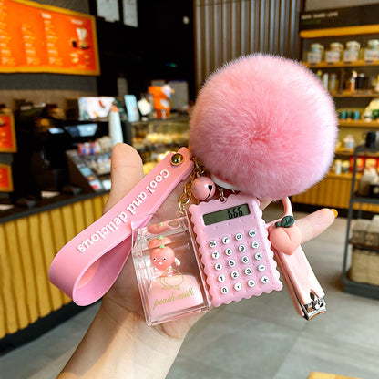 Cute 5-in-1 Keychains with Fur Ball, Paw, Nail Cutter, and Mini Calculator Charms
