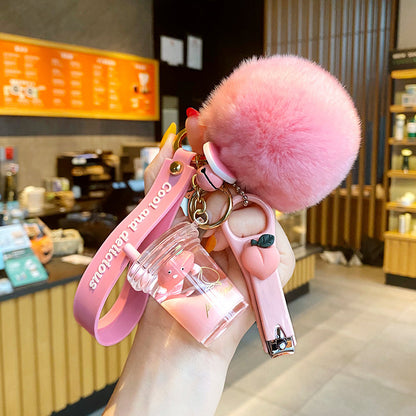 Cute 5-in-1 Keychains with Fur Ball, Paw, Nail Cutter, and Mini Calculator Charms