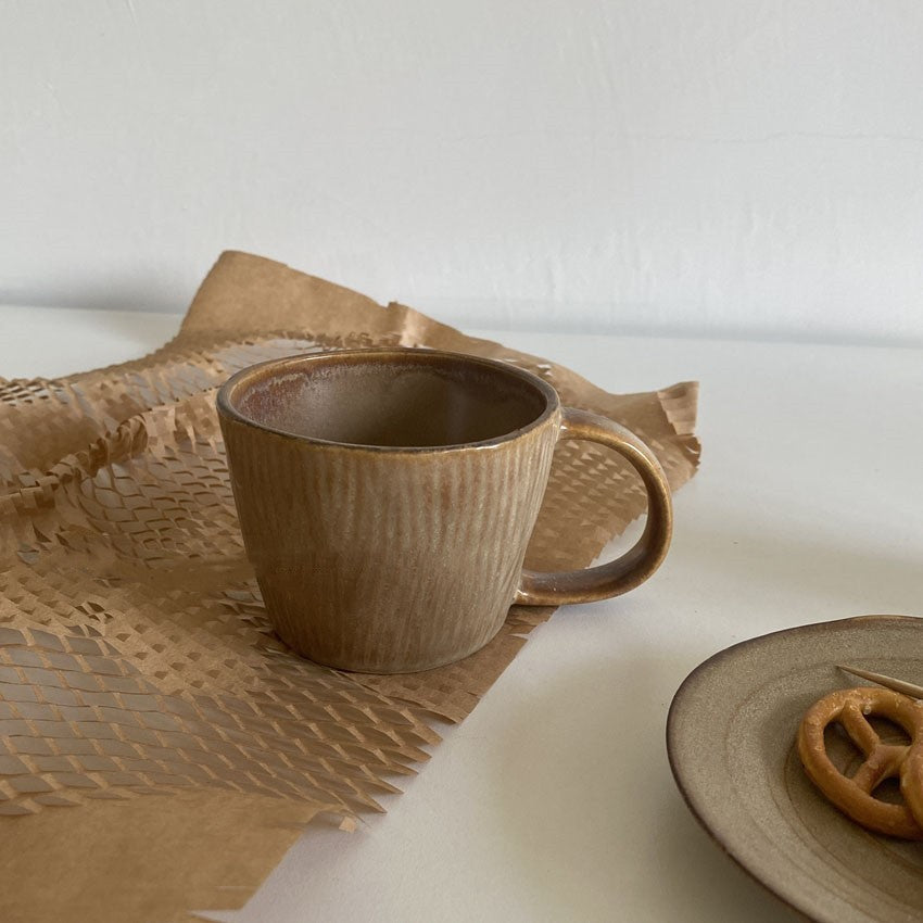 Vintage Porcelain Espresso Cups with Earthy Tones and Textured Design